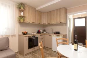 Kuchyň nebo kuchyňský kout v ubytování Apartment Olive Risan