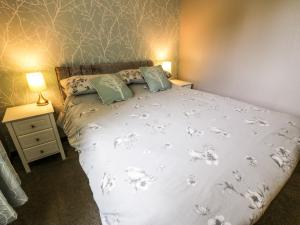Katil atau katil-katil dalam bilik di Torkeld Holiday Cottage