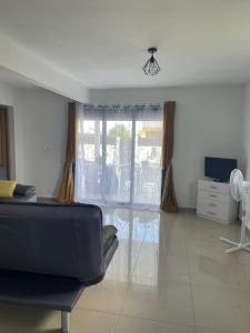 TV a/nebo společenská místnost v ubytování Magnifique appartement COZY proche de la mer