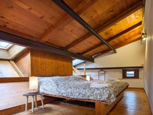 Ένα ή περισσότερα κρεβάτια σε δωμάτιο στο Ca' Gerani Valpolicella