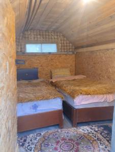 Ένα ή περισσότερα κρεβάτια σε δωμάτιο στο Eko Katun Djurisic