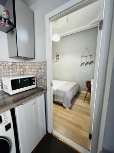 Kuchyň nebo kuchyňský kout v ubytování Iren Smart Apartment