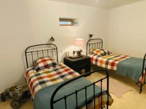 Postel nebo postele na pokoji v ubytování Grange avec vue, proche de Sarlat, calme et dépaysement au coeur du Lot