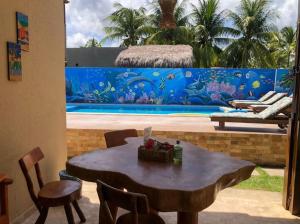 A piscina localizada em Pousada Paraíso dos Milagres ou nos arredores