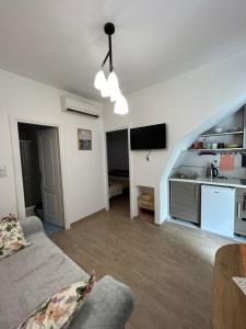 Kuchyň nebo kuchyňský kout v ubytování Old Risan Apartment