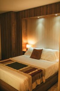 Giường trong phòng chung tại drb Suites