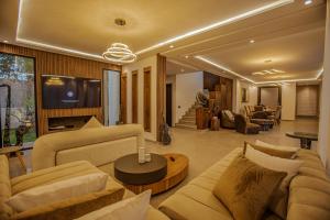 a living room with couches and a table at AD Villa in Marrakesh