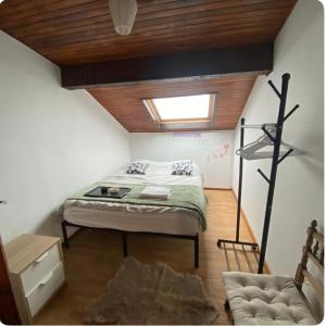 Postel nebo postele na pokoji v ubytování Maison entière proche de Genève + 1 fotografie