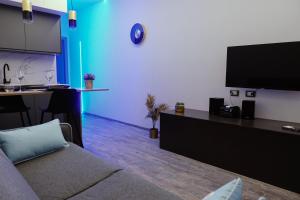 TV/trung tâm giải trí tại Royal Apartment