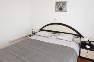 Katil atau katil-katil dalam bilik di Apartment Hiša Korte