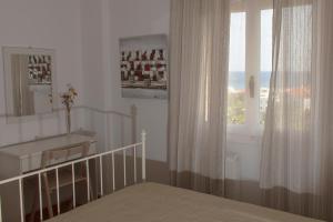 Fotografie z fotogalerie ubytování Eleni's Seaview House v destinaci Ándros