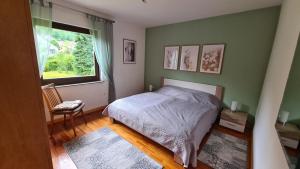 Postel nebo postele na pokoji v ubytování Haus Tildchen