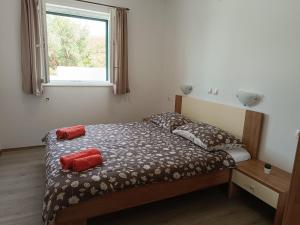 Posteľ alebo postele v izbe v ubytovaní Apartments Antonia