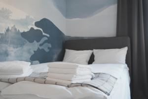 Posteľ alebo postele v izbe v ubytovaní Villa Monica Apartamenty