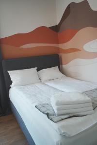 Posteľ alebo postele v izbe v ubytovaní Villa Monica Apartamenty
