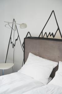 Posteľ alebo postele v izbe v ubytovaní Villa Monica Apartamenty