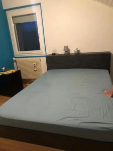 Ένα ή περισσότερα κρεβάτια σε δωμάτιο στο Maison calme à 20 minutes de Genève