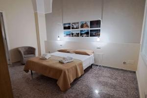 Postel nebo postele na pokoji v ubytování Casa Vacanze CHome
