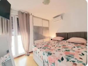 Ein Bett oder Betten in einem Zimmer der Unterkunft Beautiful Apartment, Close to Beach