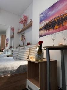 Ένα ή περισσότερα κρεβάτια σε δωμάτιο στο Post apartmani A-1