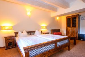 Postel nebo postele na pokoji v ubytování Hotel Stadtgut