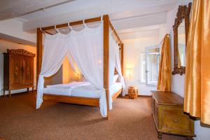 Postel nebo postele na pokoji v ubytování Hotel Stadtgut