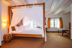 Postel nebo postele na pokoji v ubytování Hotel Stadtgut