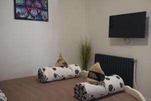 Postel nebo postele na pokoji v ubytování Tanzanit