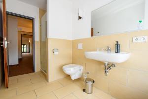 Koupelna v ubytování Hotel Stadtgut