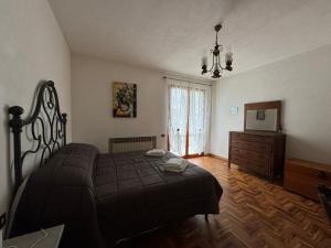 A bed or beds in a room at Villa del Biondo