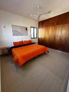 A bed or beds in a room at Your relaxation oasis in progreso