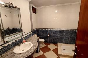 A bathroom at Villa de luxe vue sur mer