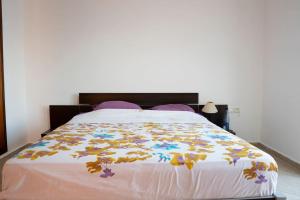 A bed or beds in a room at Villa de luxe vue sur mer