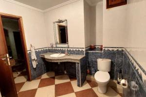 A bathroom at Villa de luxe vue sur mer