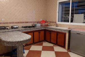 A kitchen or kitchenette at Villa de luxe vue sur mer