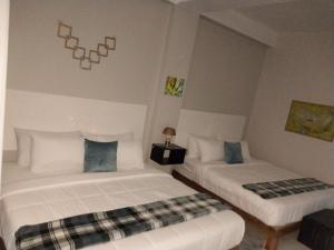 Katil atau katil-katil dalam bilik di MisBHaven Resort and Spa