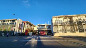 an empty street in a city with tall buildings at Number 9 on Cataract in Launceston