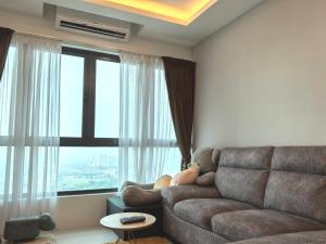 Posezení v ubytování Sky Suite Meritus Residence in Perai