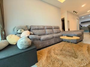 Posezení v ubytování Sky Suite Meritus Residence in Perai