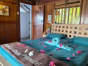 Postel nebo postele na pokoji v ubytování Prince John Dive Resort