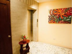 Postel nebo postele na pokoji v ubytování ARC Homes Hotel Panglao powered by Cocotel