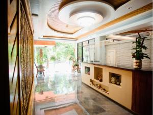 Kuchyň nebo kuchyňský kout v ubytování ARC Homes Hotel Panglao powered by Cocotel