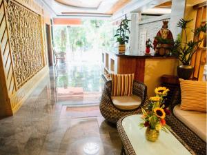 Posezení v ubytování ARC Homes Hotel Panglao powered by Cocotel