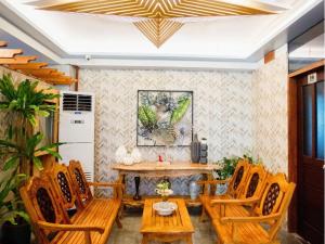 Posezení v ubytování ARC Homes Hotel Panglao powered by Cocotel