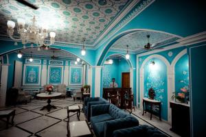 Posezení v ubytování Umaid Farm Resort- A Legancy Vintage Stay In Jaipur