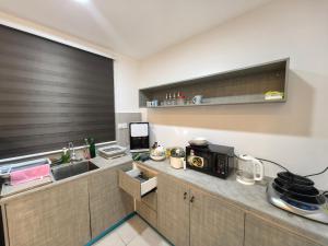 Kuchyň nebo kuchyňský kout v ubytování Sky Suite Meritus Residence in Perai