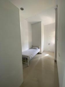 Postel nebo postele na pokoji v ubytování kamar kos
