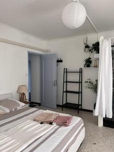 Postel nebo postele na pokoji v ubytování Ogooué appartement entier Lumineux 94m2 maxi 6 couchage 3 chambres