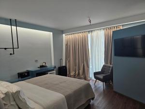 TV a/nebo společenská místnost v ubytování Hotel Porta Ksamil