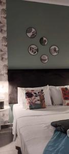 A bed or beds in a room at Chania Design Suites